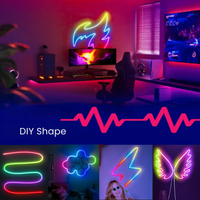 LumiFlex Aura Pro DIY Shape — gaming room met zelfgemaakte neon-vormen: lightning bolt, vlinder en vleugel